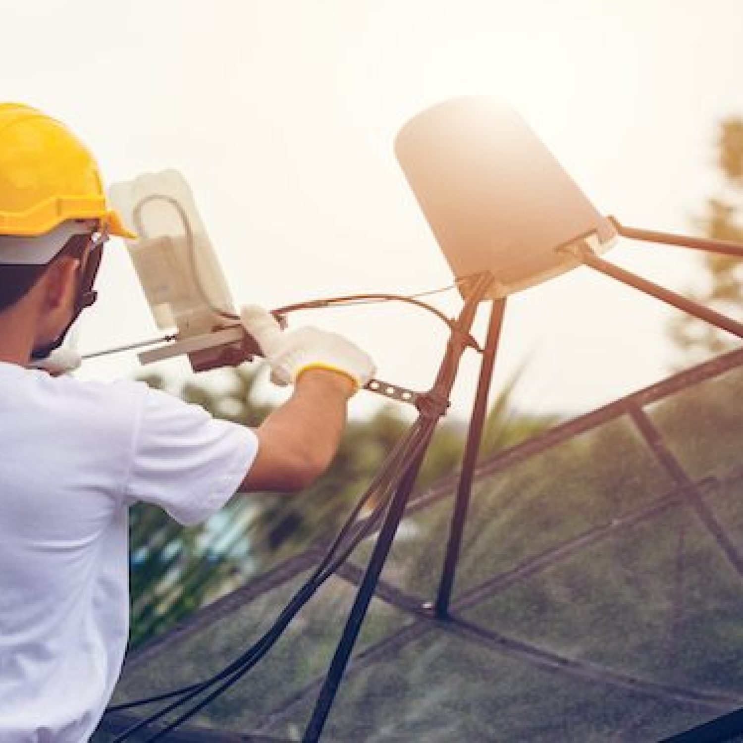 Technician is installing or check and repairing satellite receiver.